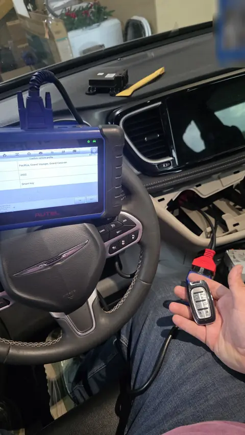 Programming a new Chrysler Pacifica smart key fob on site with a diagnostic key programmer