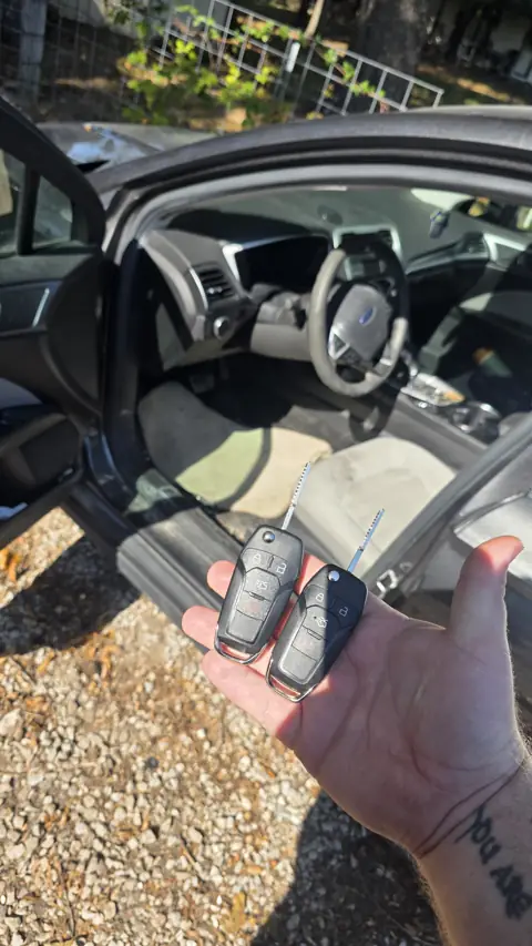 Pair of Ford flip keys made and programmed at the vehicle with the door open