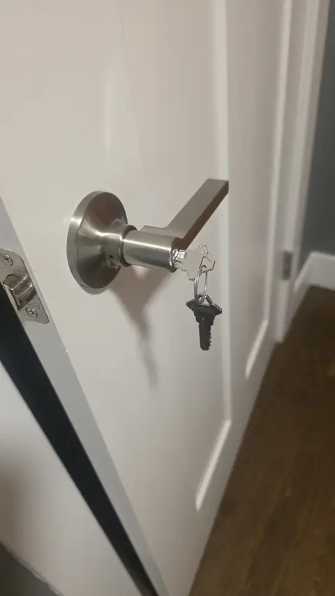 Keyed lever handle lock installed on an interior door