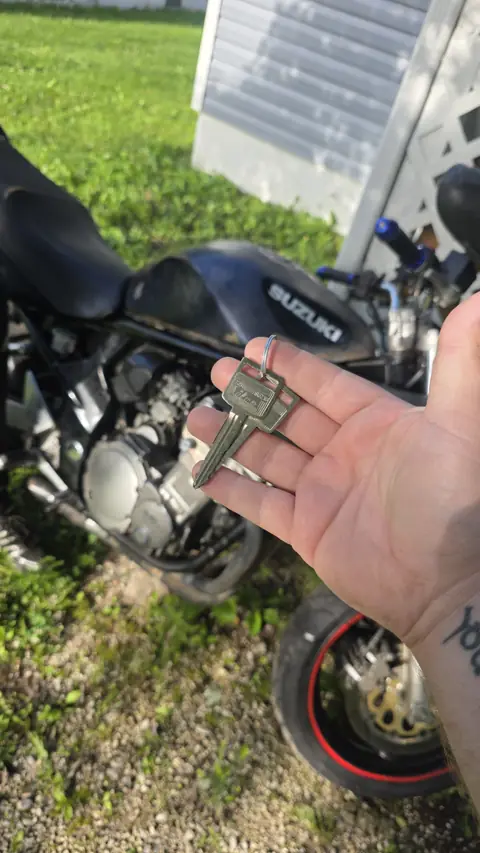 Two new keys cut for a Suzuki motorcycle with no key