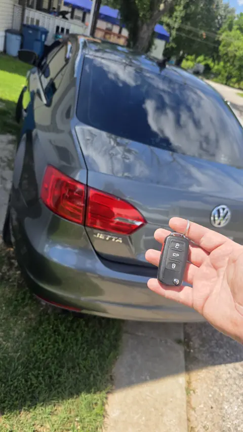 Replacement Volkswagen Jetta flip key with remote, made at the car